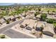 Wide aerial view of a home featuring a desert landscape, mature trees, and proximity to neighborhood amenities at 509 W Villa Rita Dr, Phoenix, AZ 85023