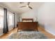 Bedroom with light colored walls and wood floor with rug at 509 W Villa Rita Dr, Phoenix, AZ 85023