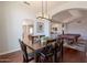 Spacious dining room featuring modern lighting and an open layout at 509 W Villa Rita Dr, Phoenix, AZ 85023
