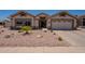 Inviting single-story home featuring a low-maintenance desert landscape and a two-car garage at 509 W Villa Rita Dr, Phoenix, AZ 85023