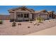 Charming single-story home with desert landscaping featuring cacti, rocks, and drought-tolerant plants at 509 W Villa Rita Dr, Phoenix, AZ 85023