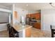 Contemporary kitchen featuring granite countertops, a breakfast bar, and stainless steel appliances at 509 W Villa Rita Dr, Phoenix, AZ 85023