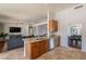Bright kitchen with granite countertops, stainless steel appliances, and seamless transition to the living and dining areas at 509 W Villa Rita Dr, Phoenix, AZ 85023
