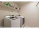 Convenient laundry room equipped with a modern washer and dryer for efficient cleaning at 509 W Villa Rita Dr, Phoenix, AZ 85023