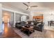 Inviting living room with hardwood floors, open floor plan, and comfortable seating at 509 W Villa Rita Dr, Phoenix, AZ 85023