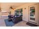 Covered patio with comfortable seating area overlooking the backyard pool, perfect for relaxation at 509 W Villa Rita Dr, Phoenix, AZ 85023