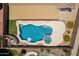 Overhead view of a custom shaped pool and spa in an attractive backyard setting at 509 W Villa Rita Dr, Phoenix, AZ 85023