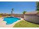 Inviting backyard pool and spa with palm trees, perfect for outdoor entertaining and relaxation at 509 W Villa Rita Dr, Phoenix, AZ 85023