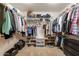 Walk-in closet with ample storage and shelving at 509 W Villa Rita Dr, Phoenix, AZ 85023