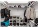 Organized walk-in closet with shelving, storage, and ample space at 533 E 7Th Pl, Mesa, AZ 85203