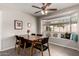 Cozy dining area features a bay window seating and a stylish wooden table at 533 E 7Th Pl, Mesa, AZ 85203