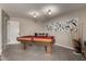 Inviting game room features a classic pool table, creating an ideal space for entertainment at 533 E 7Th Pl, Mesa, AZ 85203