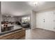 Open living room with hardwood floors, a double front door, and ample natural light at 533 E 7Th Pl, Mesa, AZ 85203