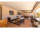 Spacious screened-in patio offering comfortable seating and dining areas for relaxing and entertaining outdoors at 533 E 7Th Pl, Mesa, AZ 85203