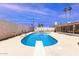 Sparkling pool set in a well-maintained backyard, perfect for outdoor fun and relaxation under the sun at 533 E 7Th Pl, Mesa, AZ 85203