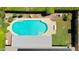 Aerial view of backyard showcasing a private pool, surrounded by greenery and a spacious patio area at 5349 W Acapulco Ln, Glendale, AZ 85306