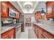 Traditional kitchen featuring granite countertops, stainless steel appliances, and wood cabinets at 5349 W Acapulco Ln, Glendale, AZ 85306
