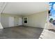 Spacious carport with two storage room entrances, perfect for parking and additional storage, with easy outdoor access at 650 N Hawes Rd # 3424, Mesa, AZ 85207