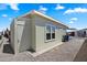 Well-maintained manufactured home with a large shed, paved driveway, and carport in a vibrant community at 650 N Hawes Rd # 3424, Mesa, AZ 85207