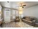 Comfortable living area with tile floors, ceiling fan, and neutral decor at 650 N Hawes Rd # 3424, Mesa, AZ 85207
