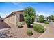 Well-maintained side yard with desert landscaping, adding to the home's curb appeal at 654 E Buckingham Ave, Gilbert, AZ 85297