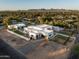 Expansive aerial view of a modern home showcasing its architecture, pool and landscaping at 6702 E Cholla St, Scottsdale, AZ 85254