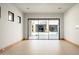 Open living space featuring sliding glass doors opening up to the luxurious outdoor pool at 6702 E Cholla St, Scottsdale, AZ 85254