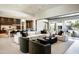 Open-concept living room flowing into the kitchen and outdoor space, great for gatherings at 6702 E Cholla St, Scottsdale, AZ 85254