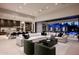 Spacious living room with ample seating, modern design, and seamless indoor-outdoor transition at 6702 E Cholla St, Scottsdale, AZ 85254