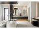 Luxurious main bathroom with freestanding tub, double vanities, and spa-like atmosphere at 6702 E Cholla St, Scottsdale, AZ 85254