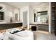 Elegant main bathroom featuring a soaking tub, vanity area, and designer finishes at 6702 E Cholla St, Scottsdale, AZ 85254
