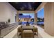 Inviting outdoor kitchen and dining area overlooking the pool and landscaping at 6702 E Cholla St, Scottsdale, AZ 85254
