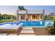 Backyard pool featuring stepping stones, desert landscaping and a modern exterior at 6702 E Cholla St, Scottsdale, AZ 85254