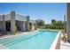 Beautiful pool surrounded by lush landscaping, creating a serene and private outdoor oasis at 6702 E Cholla St, Scottsdale, AZ 85254