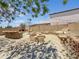 Outdoor oasis featuring a built-in bar, fireplace, fire pit, seating area, and water feature at 6712 W Northview Ave, Glendale, AZ 85303