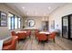 Community amenity room with stylish decor, tables, chairs, and a cozy atmosphere at 7878 E Gainey Ranch Rd # 36, Scottsdale, AZ 85258