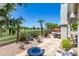 Serene backyard showcasing a well-manicured lawn, vibrant flowers, and golf course views at 7878 E Gainey Ranch Rd # 36, Scottsdale, AZ 85258