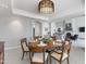 Elegant dining room with chandelier and a round table, perfect for gatherings at 7878 E Gainey Ranch Rd # 36, Scottsdale, AZ 85258