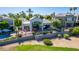 Beautiful home with a pool, patio, lush landscaping, and fenced yard at 7878 E Gainey Ranch Rd # 36, Scottsdale, AZ 85258