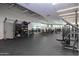 A spacious gym with a variety of equipment, including weight machines and free weights at 7878 E Gainey Ranch Rd # 36, Scottsdale, AZ 85258