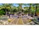 Community entrance with prominent signage, desert landscaping, and palm trees, creating a welcoming ambiance at 7878 E Gainey Ranch Rd # 36, Scottsdale, AZ 85258
