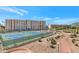 Enjoy the community's amenities including tennis courts, sidewalks, and desert landscaping at 7960 E Camelback Rd # 409, Scottsdale, AZ 85251