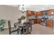 Eat-in kitchen with stainless appliances, granite countertops, wooden cabinetry, and open layout, perfect for modern living at 7960 E Camelback Rd # 409, Scottsdale, AZ 85251