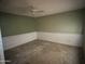 Versatile bedroom awaiting transformation with neutral walls, wainscotting, and ample space for customization at 8063 N 31St Ln, Phoenix, AZ 85051