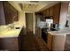 Functional kitchen with stainless steel appliances, ample cabinetry, and tile flooring for easy maintenance at 8063 N 31St Ln, Phoenix, AZ 85051