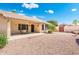 Backyard patio with a table and chairs for relaxing outdoors at 8958 W Rosemonte Dr, Peoria, AZ 85382