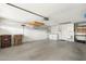 Spacious garage featuring ample space, storage options, and modern appliances at 8958 W Rosemonte Dr, Peoria, AZ 85382