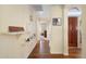 Inviting hallway with hardwood floors, showcasing a warm and welcoming entrance at 8958 W Rosemonte Dr, Peoria, AZ 85382