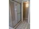 Glass enclosed shower with a tiled interior, seamlessly blending convenience and style at 10190 N 106Th E St, Scottsdale, AZ 85258