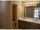Bathroom showcasing a double sink vanity, neutral color palette, and bright lighting at 10190 N 106Th E St, Scottsdale, AZ 85258